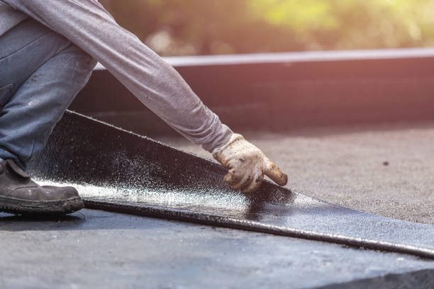 Professional Basement Waterproofing technician working in Munford, AL